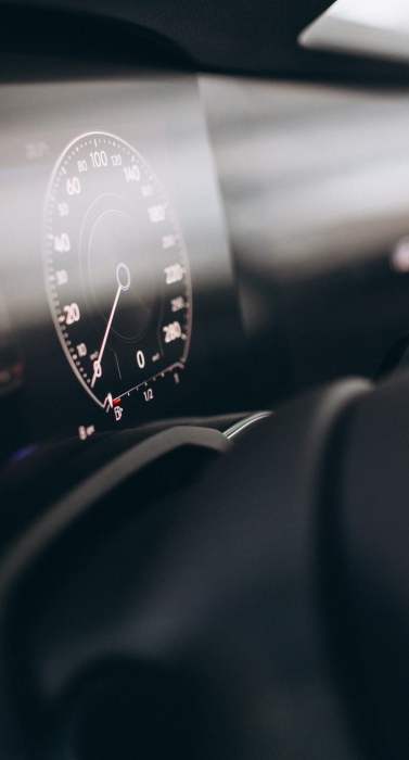 Car dashboard and wheel close up