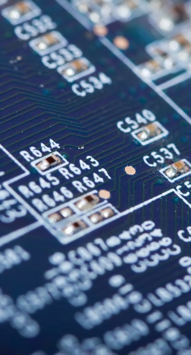 view of computer printed circuit as background. Shallow DOF